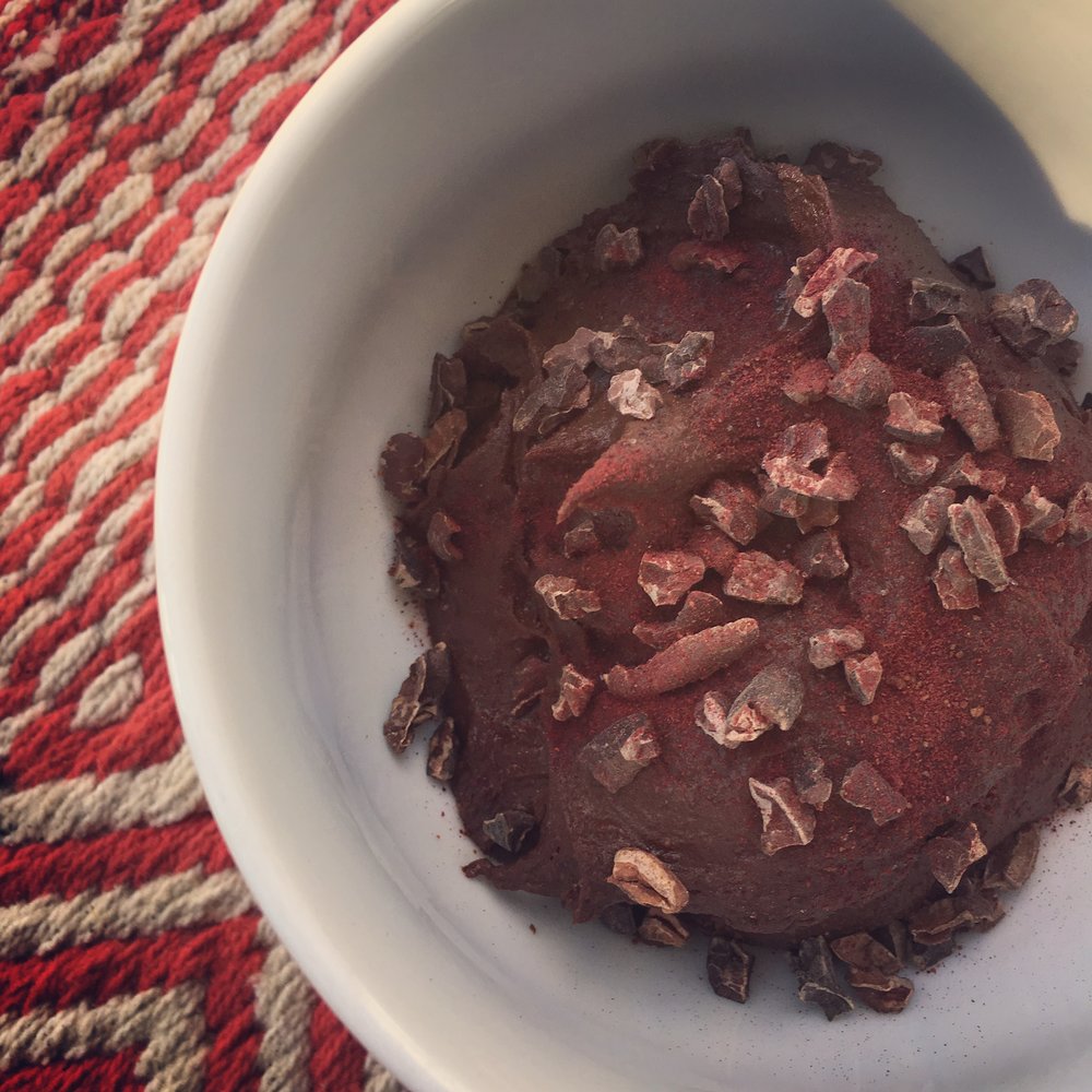 Nutrition Atlanta Brownie batter hummus topped with organic beet powder and raw cacao nibs