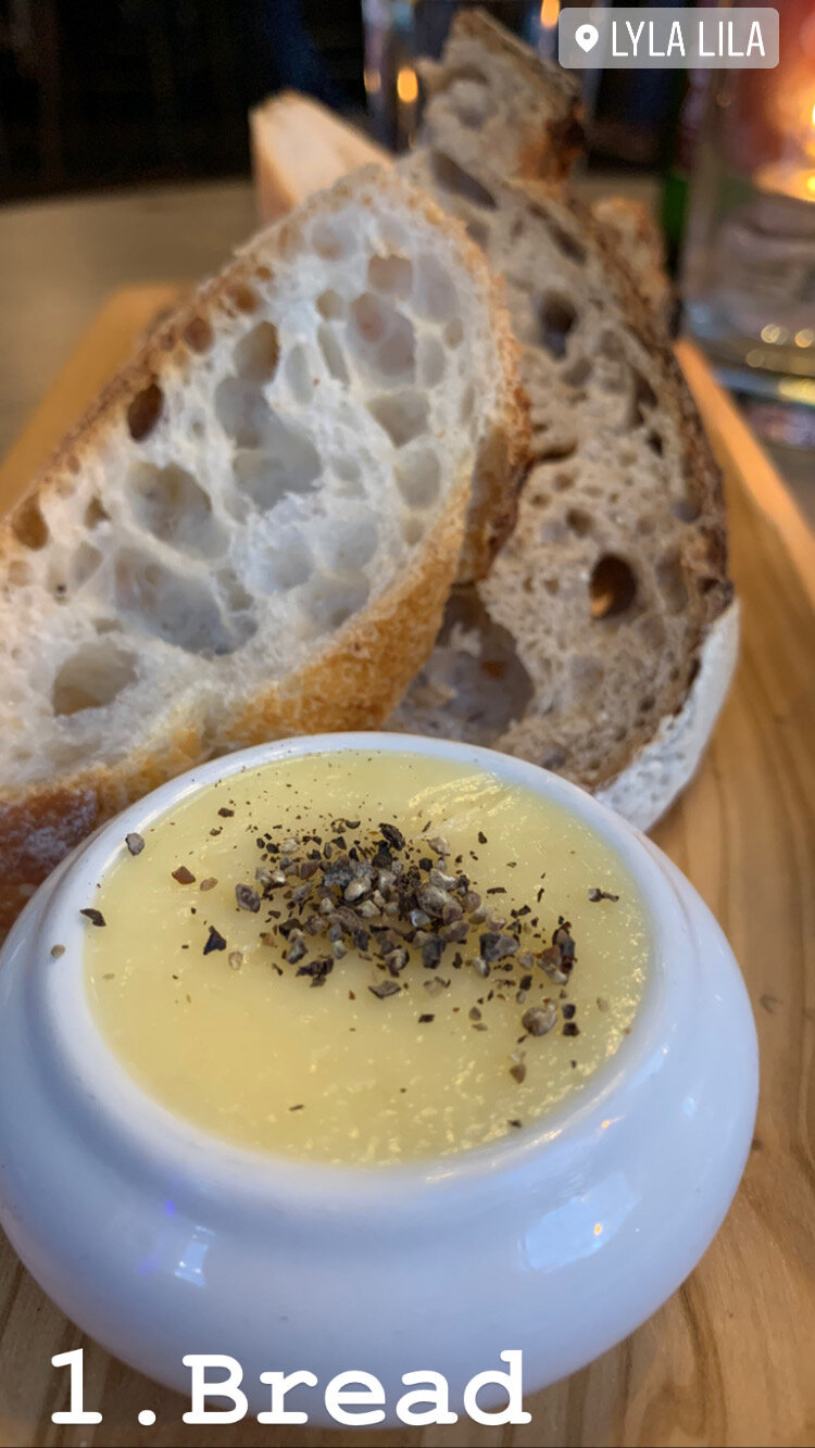 Bread with house butter, wildflower honey and black pepper